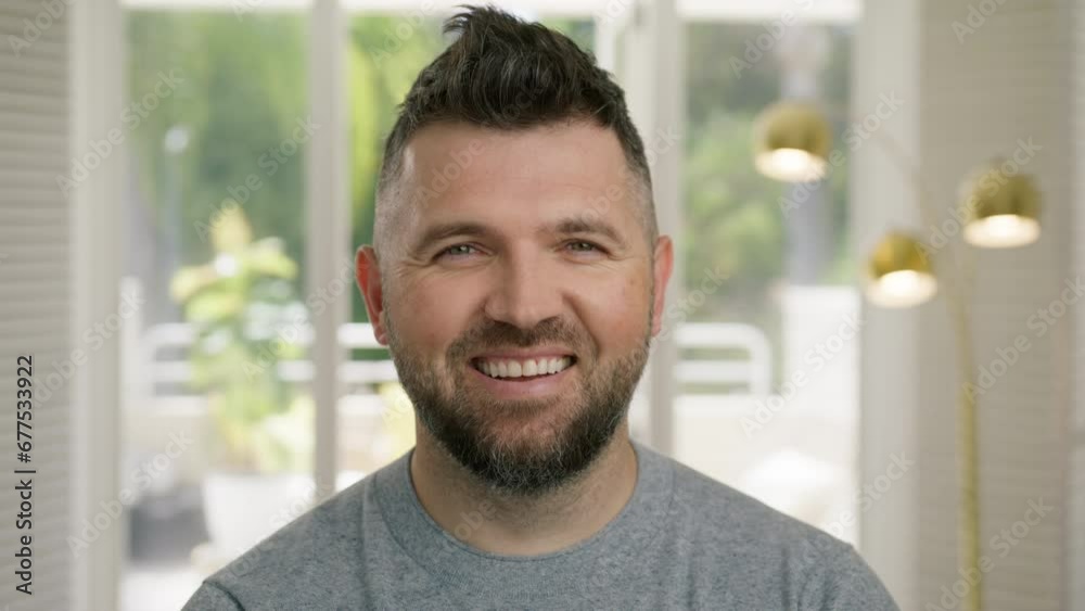 Confident happy handsome smart young adult entrepreneur, leader, manager posing at home. Close up face business portrait 4K shot. Smiling bearded mature professional businessman 40s looking at camera Confident happy handsome smart young adult entrepreneur, leader, manager posing at home. Close up face business portrait 4K shot. Smiling bearded mature professional businessman 40s looking at camera