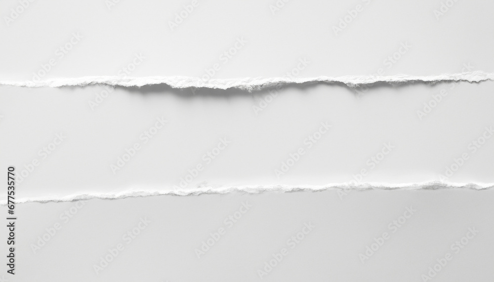 Fototapeta premium A piece of torn white paper on a white background.