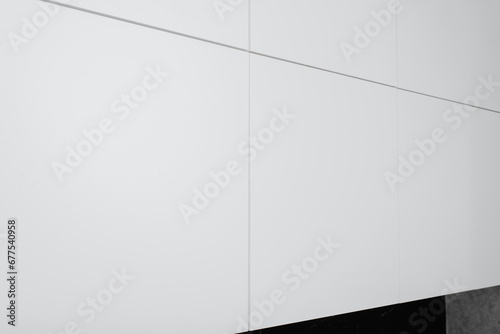 White minimalistic kitchen drawers, close-up
