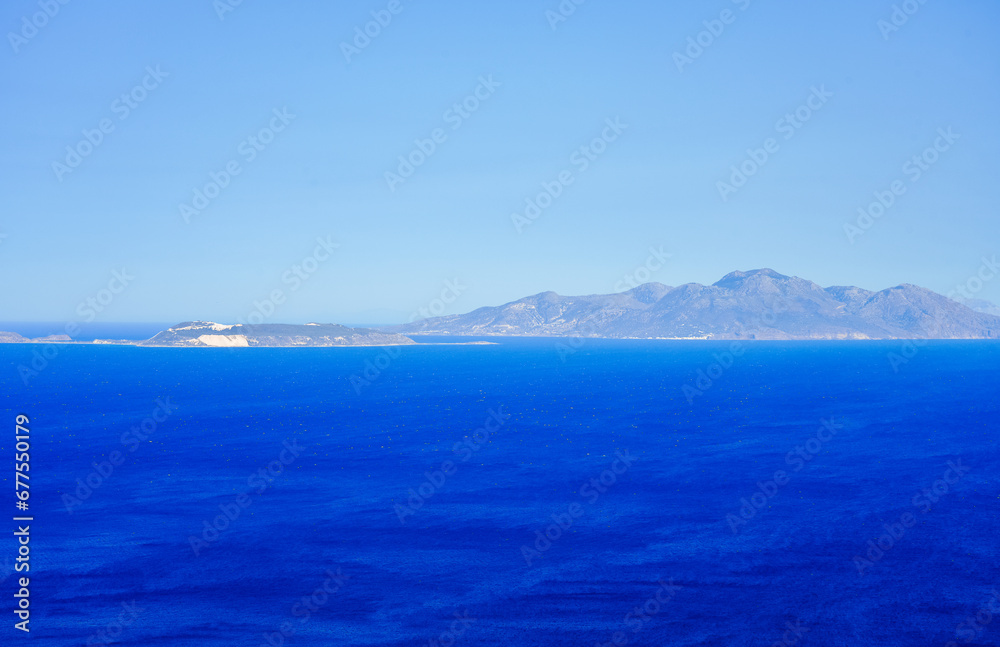 View of the landscape and the Mediterranean Sea from a mountain on the Greek island of Kos. View of the landscape and the Mediterranean Sea from a mountain on the Greek island of Kos.