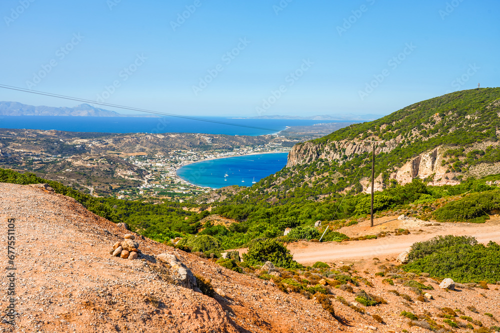 View of the landscape and the Mediterranean Sea from a mountain on the Greek island of Kos.	