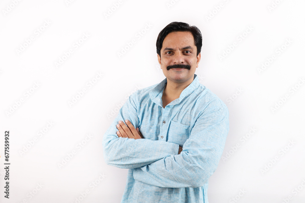 Happy rural Indian farmer standing in the white background, the passionate farmer full of enthusiasm shows sense of achievement and accomplishments. Happy rural Indian farmer standing in the white background, the passionate farmer full of enthusiasm shows sense of achievement and accomplishments.