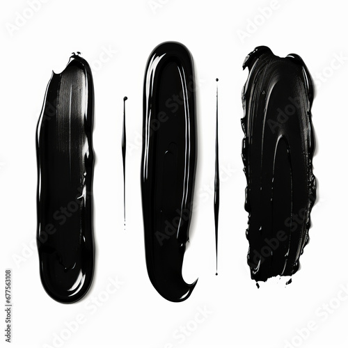 Black lipstick smear on white background. Element for beauty cosmetic design. photo