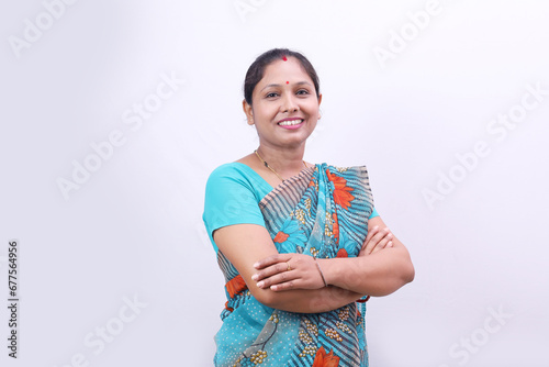 Photography Indian rural happy villager woman standing in saree on a white background