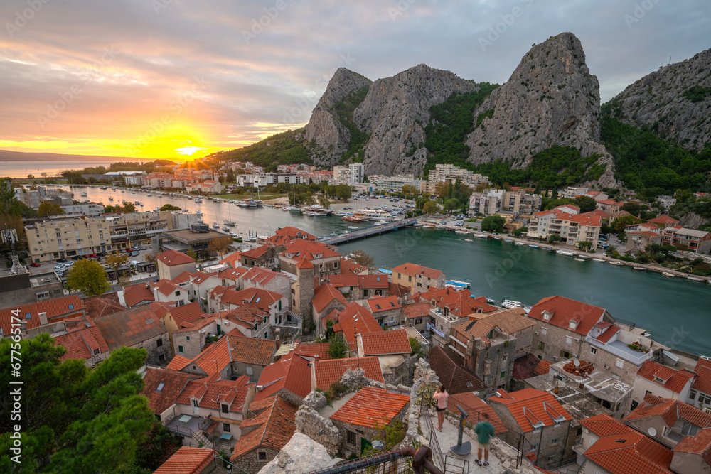 Romantic view of the panorama of the old town of Omis in Dalmatia,Croatia - obrazy, fototapety, plakaty 