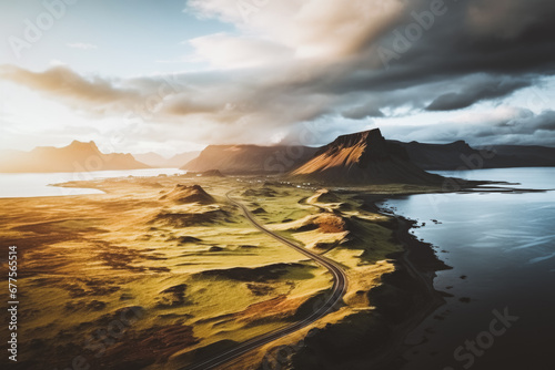 Scenic road in Iceland, beautiful nature landscape aerial panorama, mountains and coast at sunset, nordic
