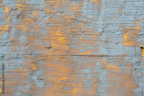 Stucco rough surface, the background of the grunge wall, . Bronze and light blue. Background or texture for design