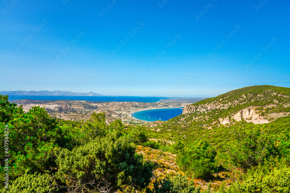 View of the landscape and the Mediterranean Sea from a mountain on the Greek island of Kos.	