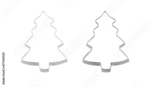 Cookie cutters of Christmas fir tree shape. Blank metal tree isolated on white background.
