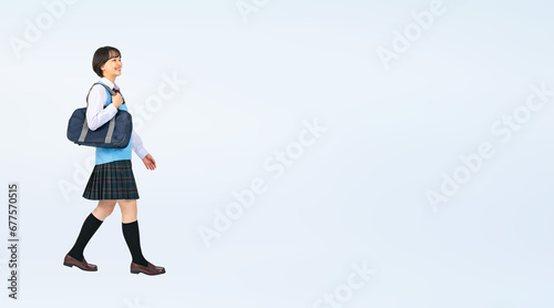 歩く制服を着た女子学生　切り抜き全身写真（切り抜き背景透過PNGも販売しております。作成者リンクから「PNG」で検索してください） photo