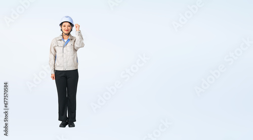 ガッツポーズするヘルメットと作業服を着た女性　作業員　エンジニア　切り抜き全身写真（切り抜き背景透過PNGも販売しております。作成者リンクから「PNG」で検索してください）