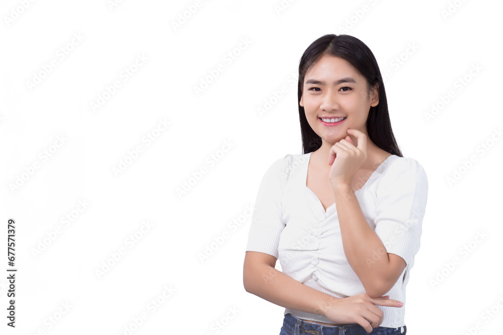 Portrait confident young Asian woman in white shirt touches her face and smiles isolated on white background. Portrait confident young Asian woman in white shirt touches her face and smiles isolated on white background.