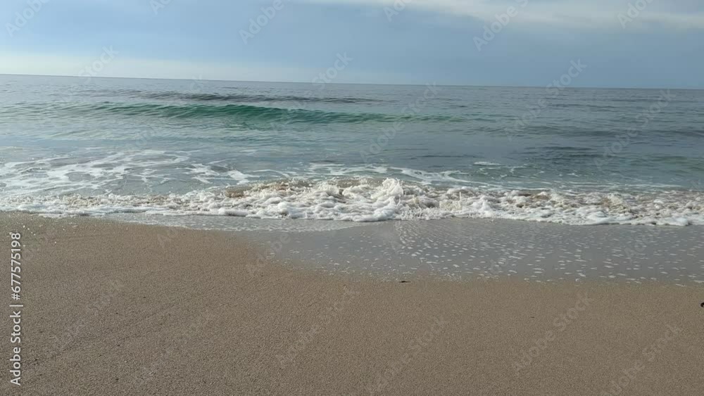 Smooth movement with slow motion of the beach shore with turquoise and crystal clear water. 4k video of the completely calm sea and quiet place. Smooth movement with slow motion of the beach shore with turquoise and crystal clear water. 4k video of the completely calm sea and quiet place.