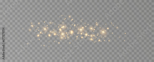 Golden sequins glow with many lights. Glittering dust. Luxurious background of golden particles.	