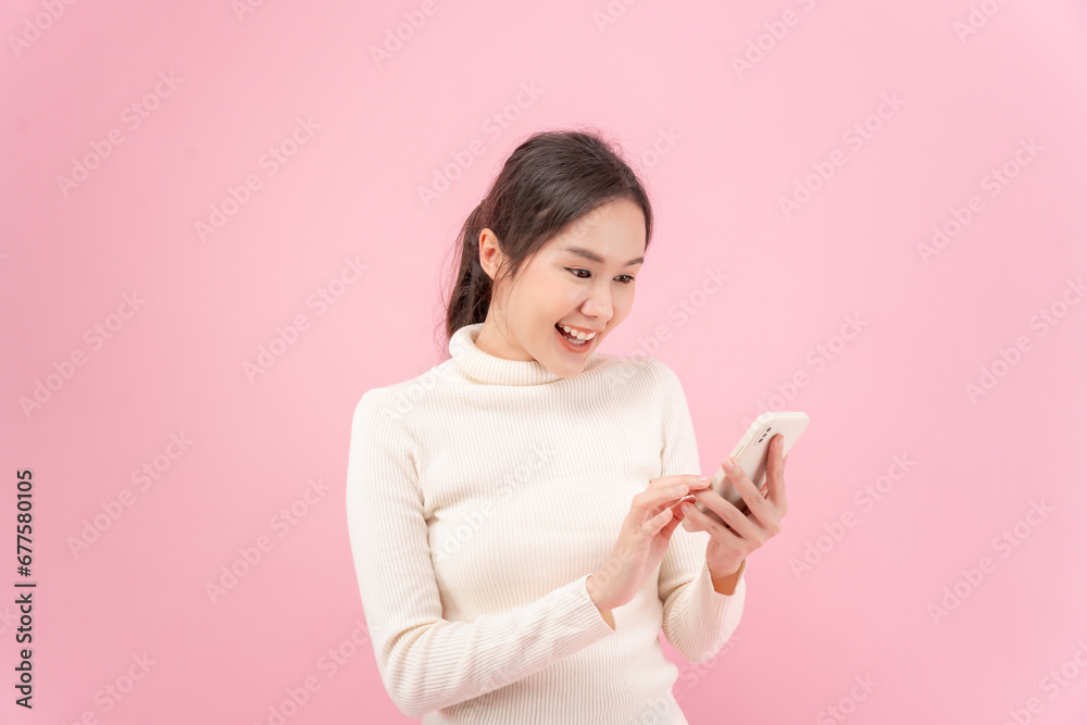 Asian beautiful woman exited surprise face expression . female feels shocked with the phone. exciting smile and happy adorable rejoices. Very enjoy and fun relax time. wow, girl holding smartphone. Asian beautiful woman exited surprise face expression . female feels shocked with the phone. exciting smile and happy adorable rejoices. Very enjoy and fun relax time. wow, girl holding smartphone.
