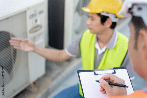 Engineers use check list check air condition systems on site. Contractor and inspector inspection compressor during project. maintenance team check quality assurance. Audit, inspect, quality.