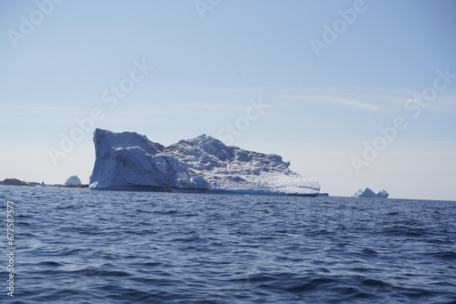 arctic icebergs melting on arctic ocean in greenland