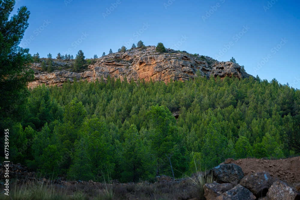 Side view of mount La Muela moments before nightfall in Rincón de Ademuz on the Iberian Peninsula