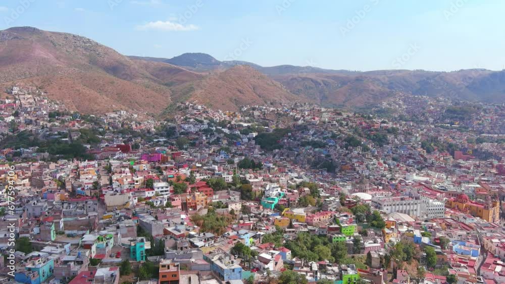 Mexico, Guanajuato: Aerial view of capital city of Mexican state of same name, typical buildings of many vibrant colors - landscape panorama of Latin America from above Mexico, Guanajuato: Aerial view of capital city of Mexican state of same name, typical buildings of many vibrant colors - landscape panorama of Latin America from above
