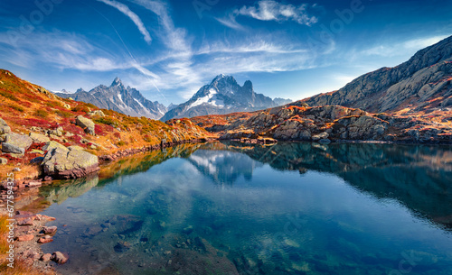 Calm autumn view of Chesery lake (Lac De Cheserys), Chamonix location. Exciting morning scene of Vallon de Berard Nature Preserve, Graian Alps, France. Beauty of nature concept background.