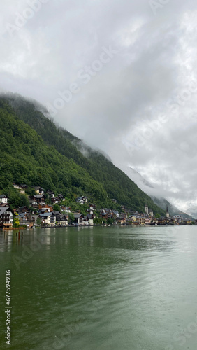 Hallstatt Austria city view landscape background wallpaper vertical lake green cloudy weather