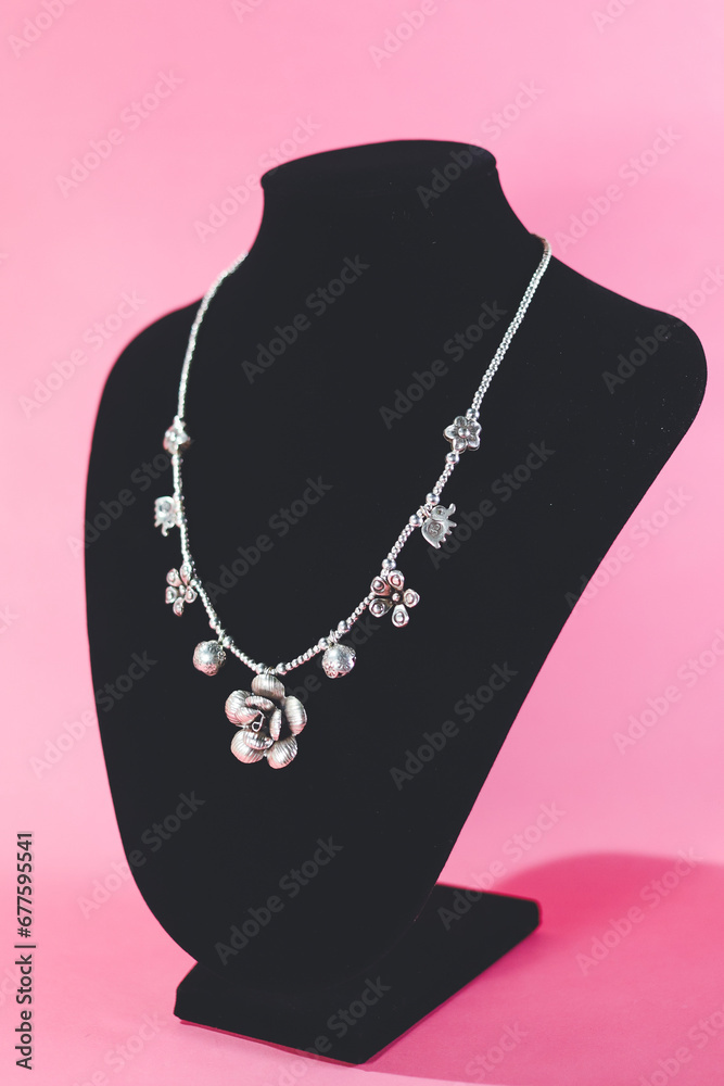 Hmong silver jewelry on black background, Handmade silver accessories Hmong silver jewelry on black background, Handmade silver accessories