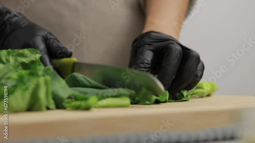 Wholesome Cooking. Chef's Skillful Hands Chop Kale in a Home Kitchen, Transforming Fresh Ingredients into Delicious, Nutrient-Packed Meals