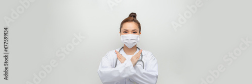 Serious asian woman doctor prohibit patient behavior, showing stop, disapprove smth bad