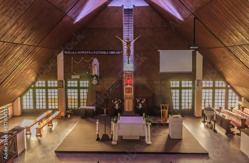 The interior of the wooden parish church of the Finding of the Holy Cross in the district Glebce in the tourist town - Wisla in the Silesian Beskids (Poland).