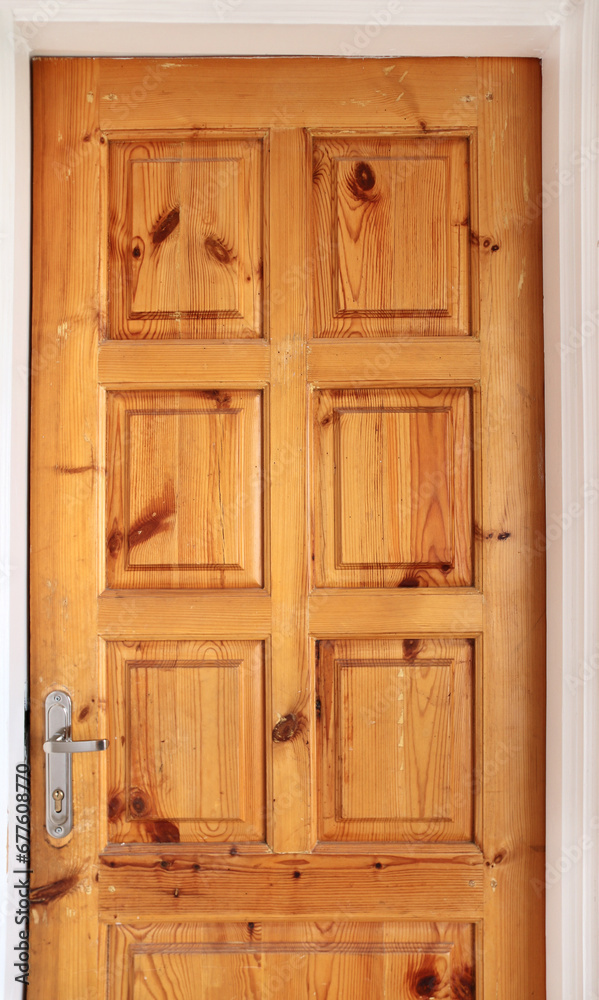 Front view of old wood door. Retro wooden closed door