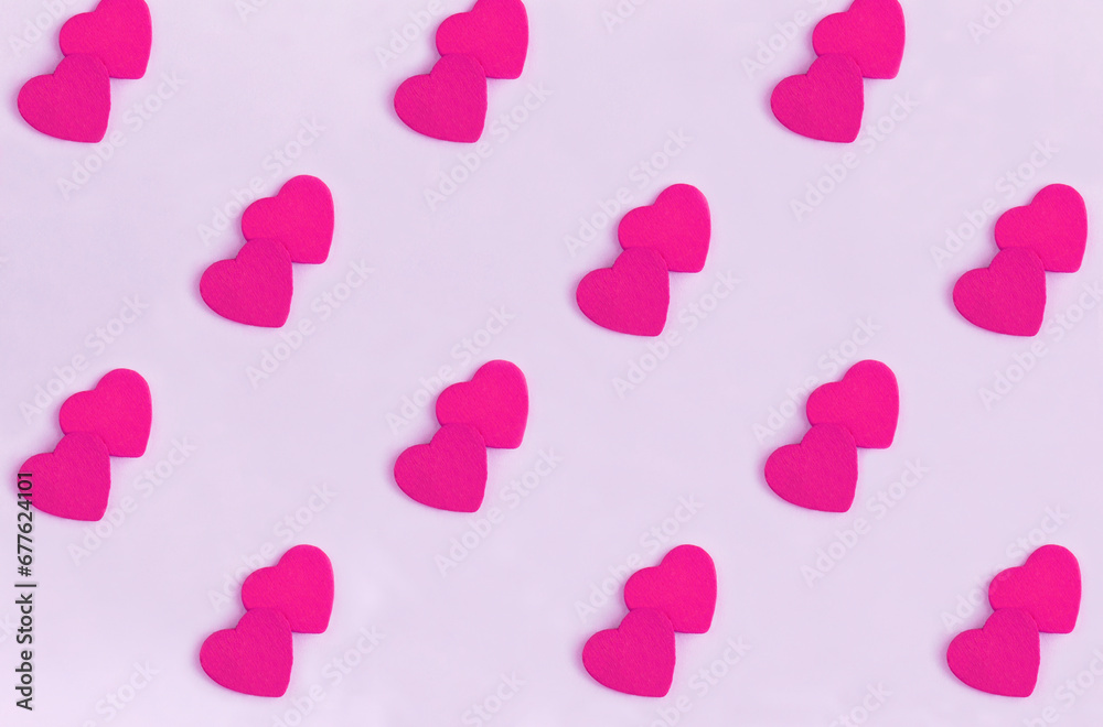 Background for Valentine's day. Pink hearts on the pink background. Flay lay. Pattern. Background for Valentine's day. Pink hearts on the pink background. Flay lay. Pattern.