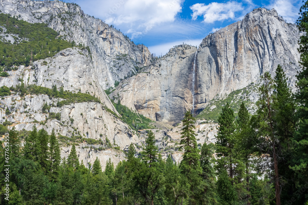 Upper Yosemite Falls Tumbling Into The Valley Below in a very dry summer season, seen from sentinel meadow.