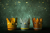 Three crowns of the three wise men and christmas lights. Concept for Reyes Magos day. Three Wise Men concept