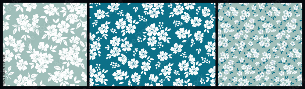 Seamless floral pattern, liberty ditsy print with rustic motif in the collection. Cute botanical design with simple hand drawn plants: small white flowers, tiny leaves on a blue background. Vector.