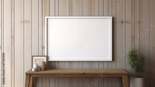 Blank framed photo hanging on wood interior wall, warm sunlight shining through