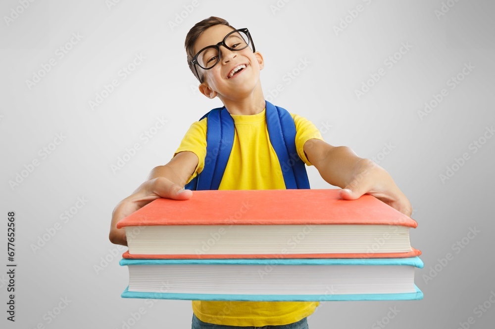 adorable smiling school student holding book adorable smiling school student holding book