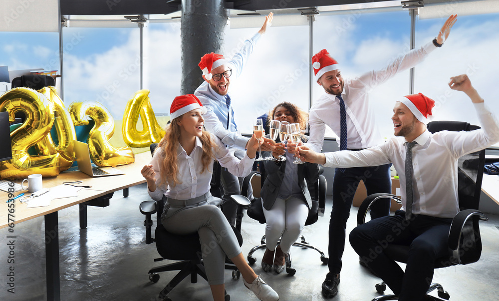 Business people are celebrating holiday in modern office drinking champagne and having fun in coworking. Merry Christmas and Happy New Year 2024 - obrazy, fototapety, plakaty 