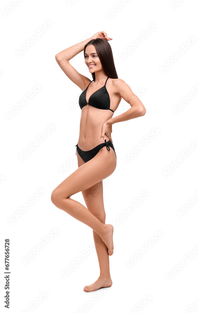 Young woman in stylish bikini isolated on white