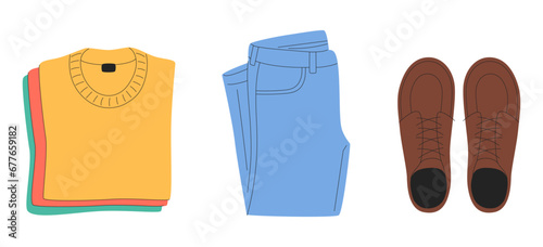 A stack of neat and clean clothes. Preparing for the trip. Clothes design elements isolated on a white background.