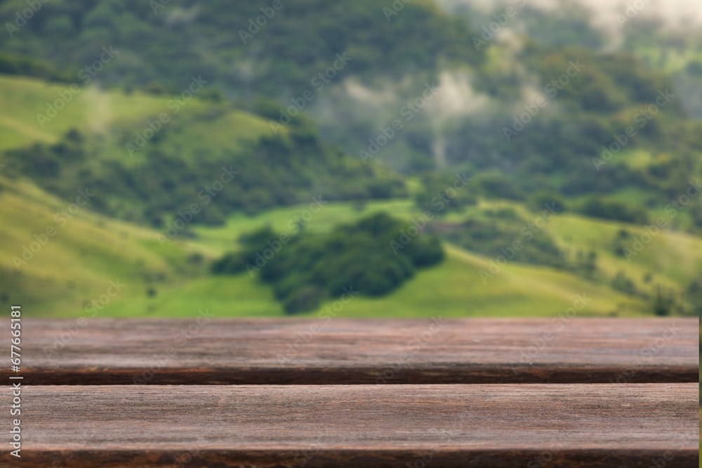 Wood blank table top in outdoors nature background. Wood blank table top in outdoors nature background.