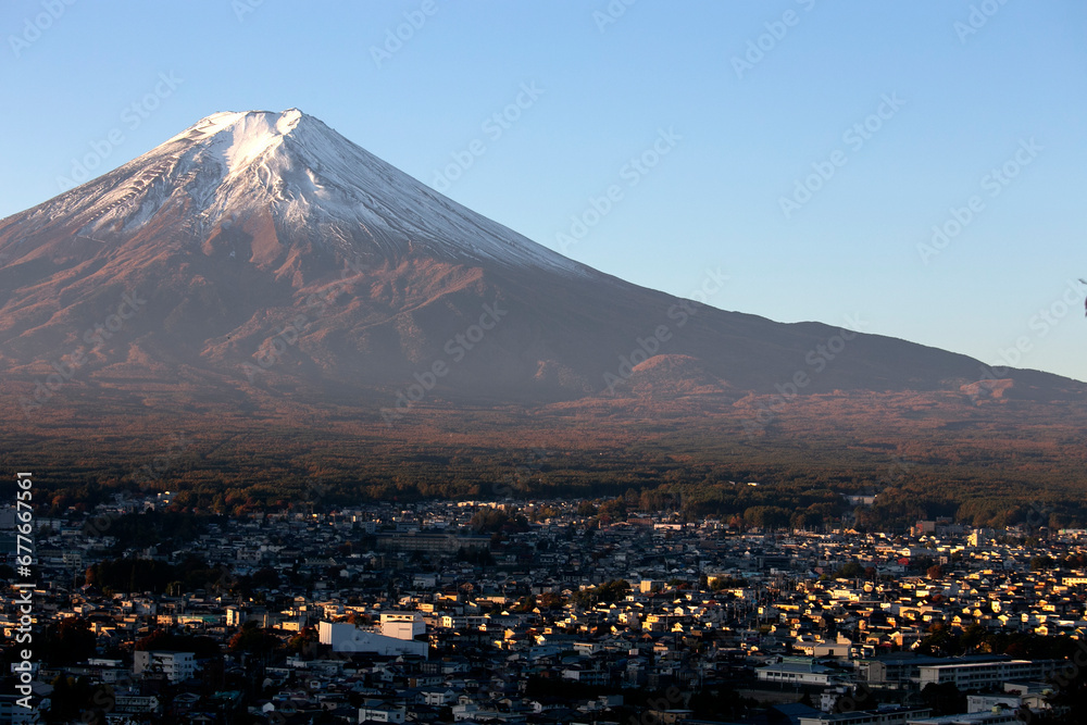 Views of Mount Fuji at dawn from the Chureito Pagoda temple in Fujiyoshida, Japan.