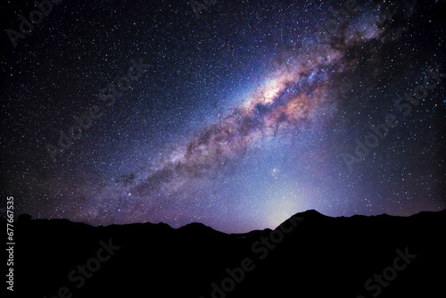 View of the starry night over the mountain in the desert of Bolivia. photo