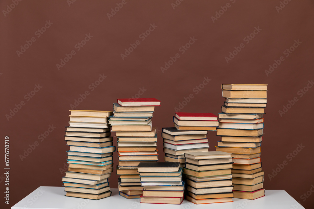 science learning library stack of books on brown background science learning library stack of books on brown background