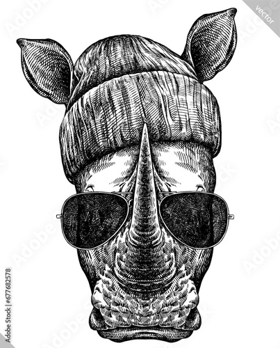 Vintage engraving isolated rhinoceros glasses dressed fashion set illustration ink sketch. Africa background rhino silhouette sunglasses hipster hat art. Black and white hand drawn vector image