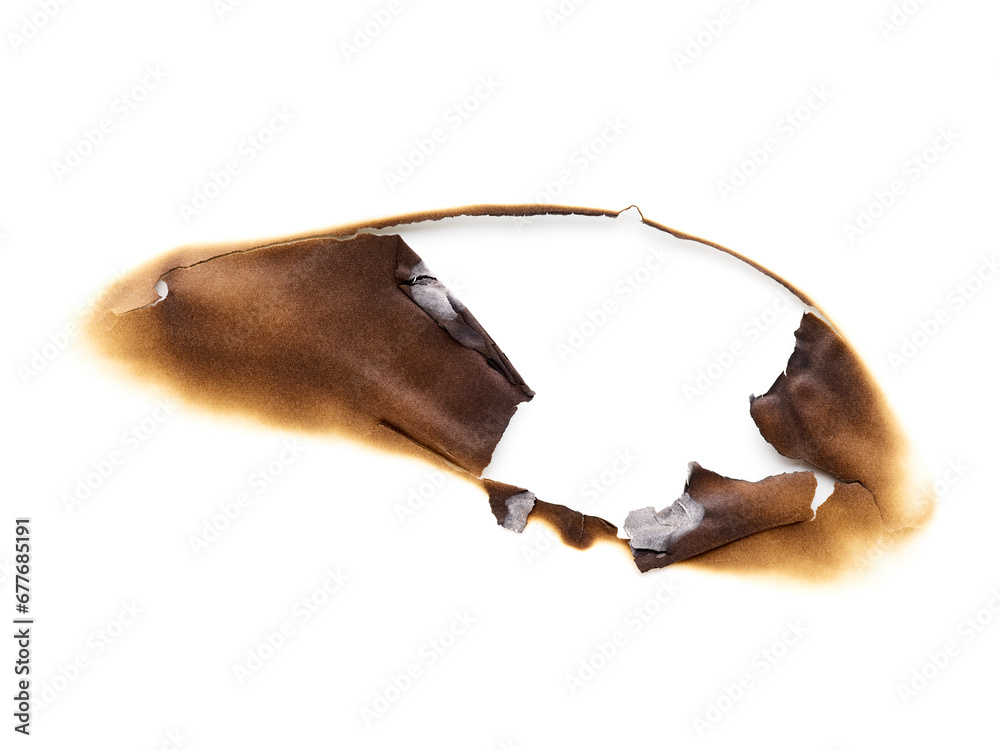 Obraz premium burned hole in paper isolated on white background