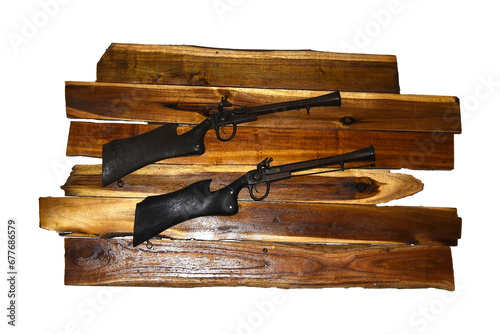Wooden background rifle, antique rifle, wall decoration photo
