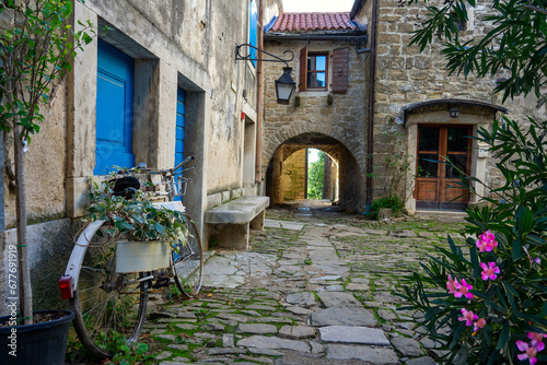 charming little village in Croatia called the istrian Toscana with stone walls and nice doors and windows photo