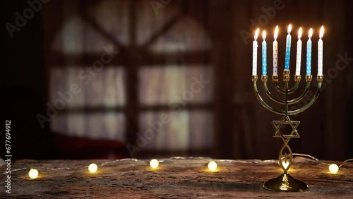 Lit Candles on a Candlestick for Hanukkah photo