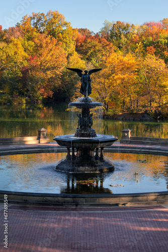 Central Park in Fall by the Lake with Bethesda Terrace and fountain. Manhattan, New York City