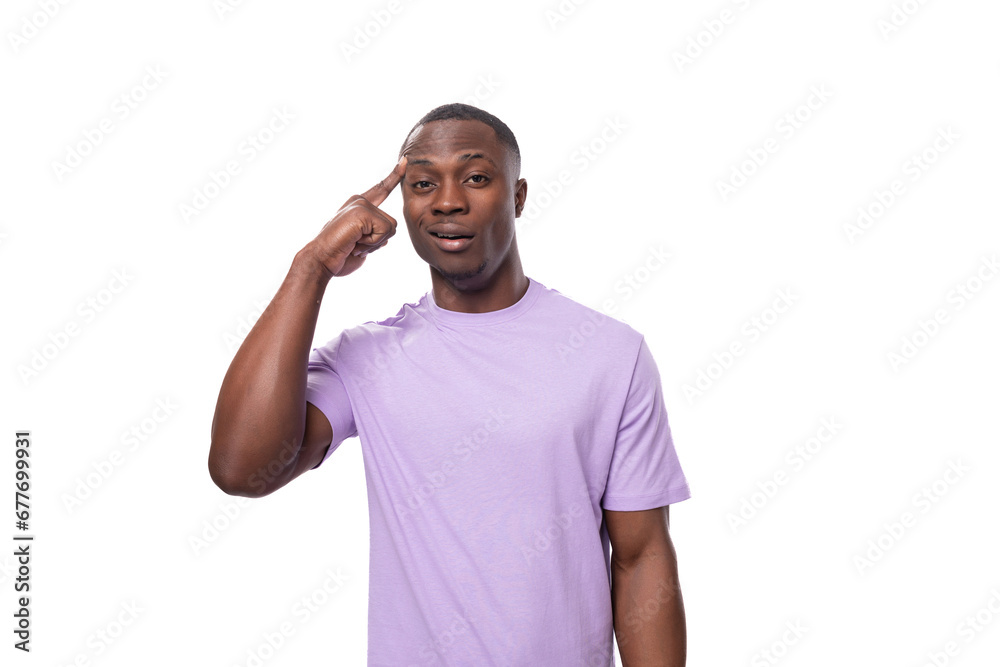 young adorable african man with short haircut wearing lilac t-shirt young adorable african man with short haircut wearing lilac t-shirt
